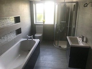 Family bathroom with bath and quadrant shower